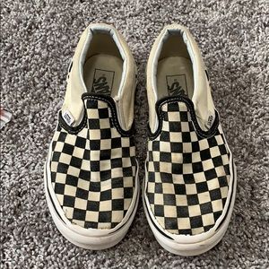 Size 1 Vans black and cream checker slip ons.